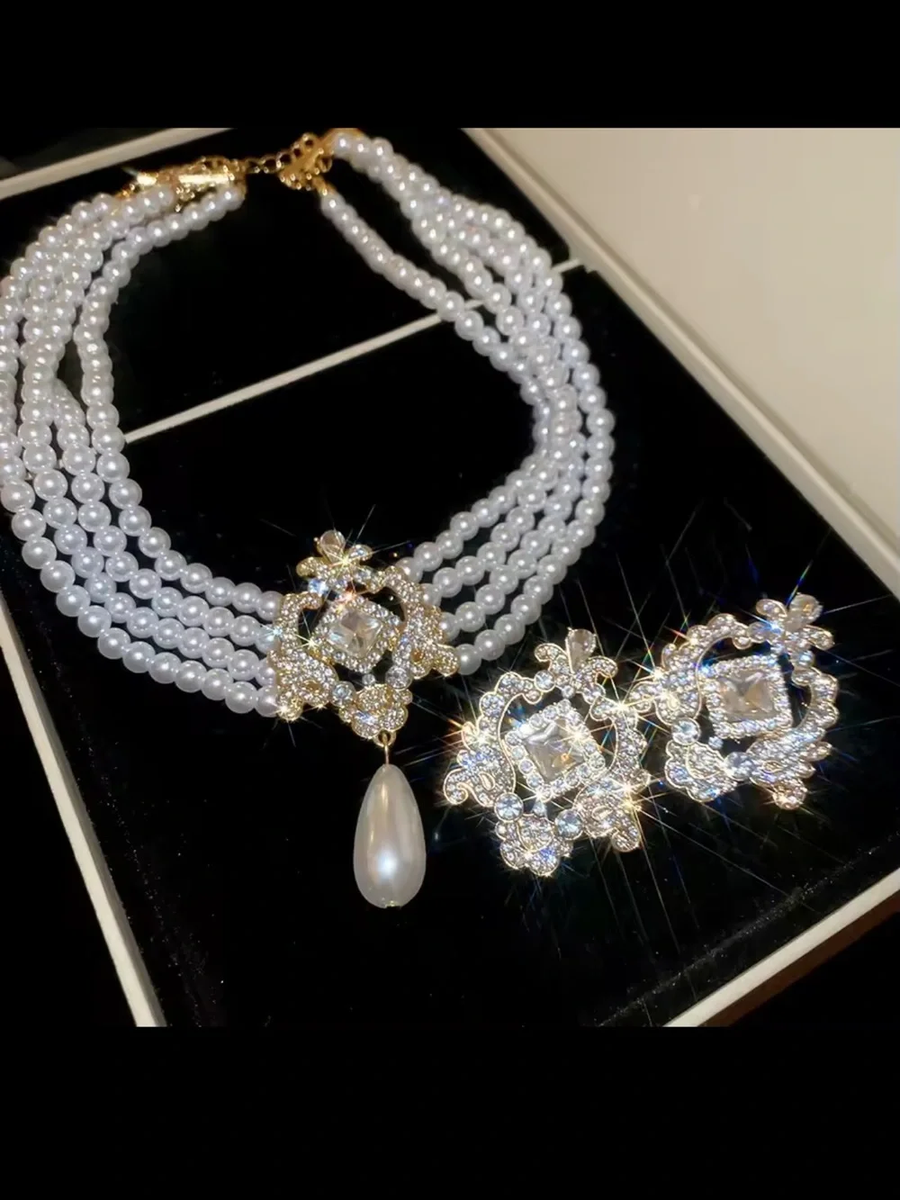White Pearl Multi-Strand Necklace and Earring set with Gold and Crystal Pendant